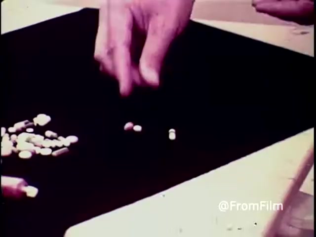 Depicts a hand placing various pills, showcasing the variety discussed.